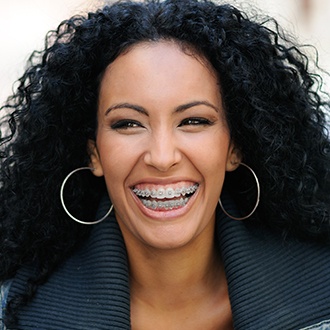 Woman with braces smiling