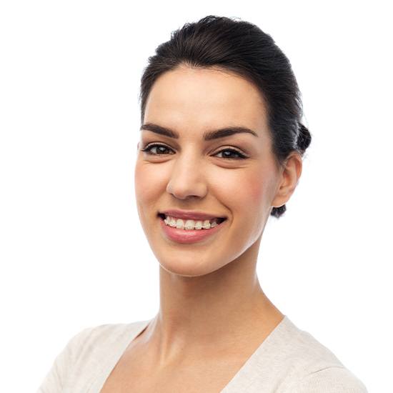 Smiling woman with clear and ceramic braces