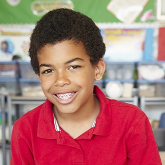 Young boy undergoing pediatric orthodontic treatment