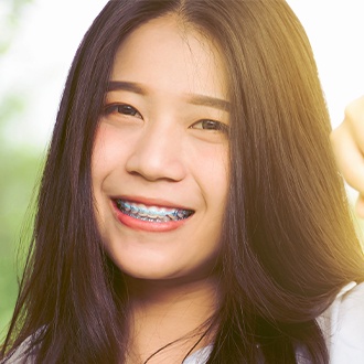 Teen girl with braces smiling