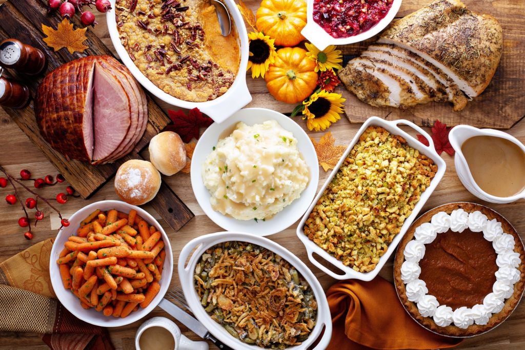 Array of Thanksgiving foods on table
